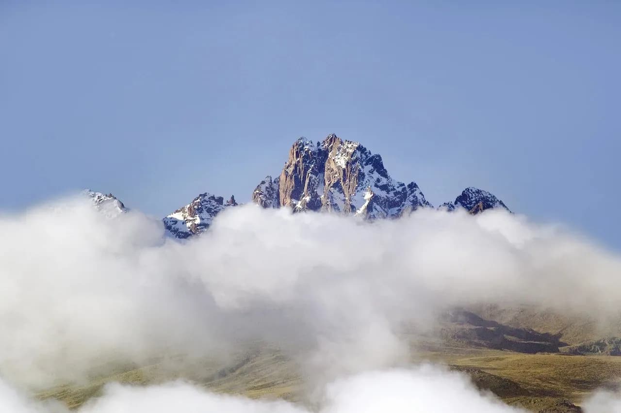 Mount Kenya's jagged peaks rising above clouds