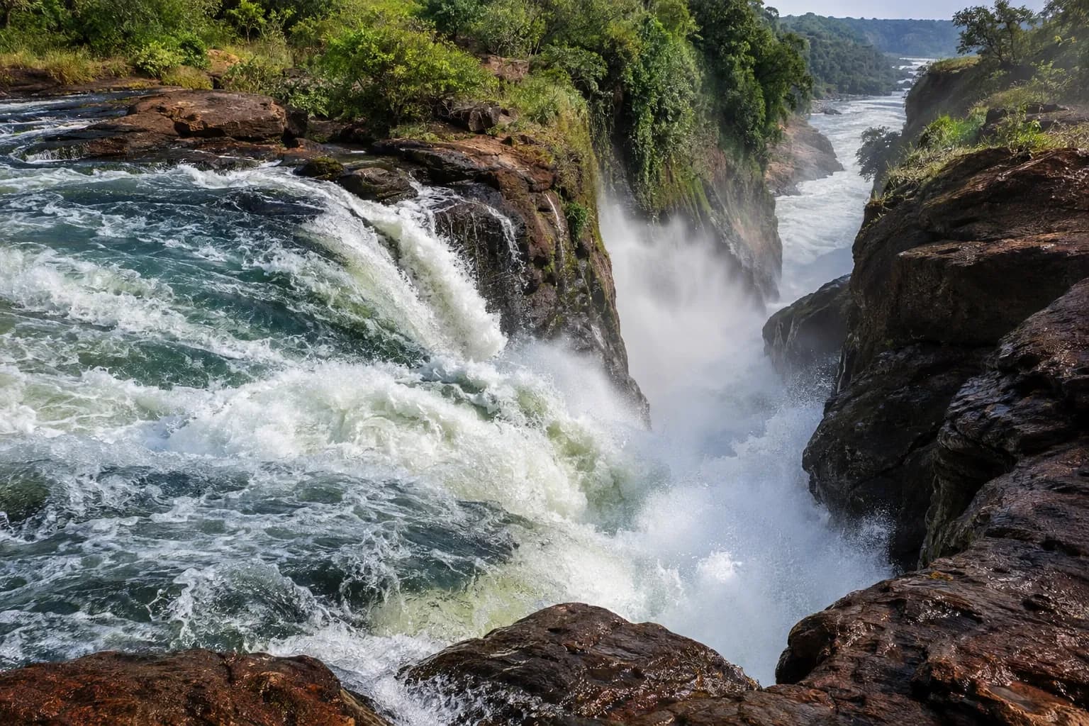 The Victoria Nile surging into the upper gorge at Murchison Falls