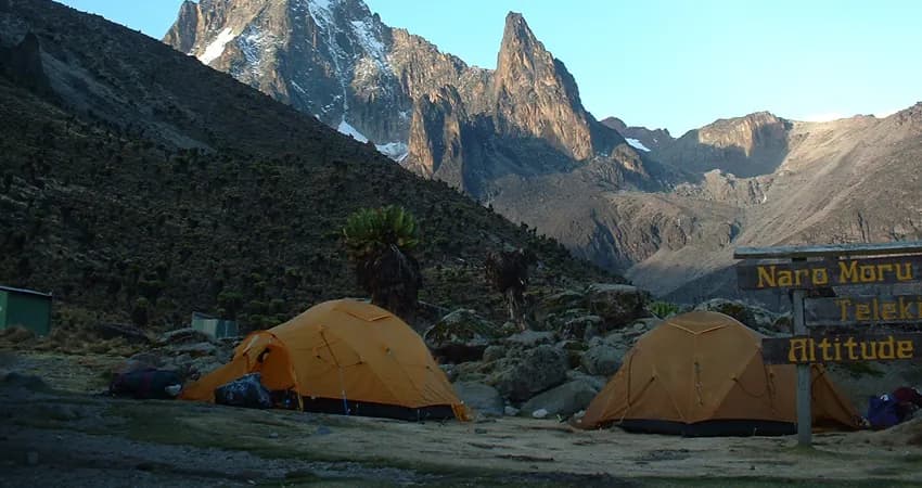 Tents pitched at a high camp below Mount Kenya's peaks